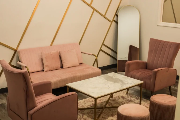 Spacious hall with banquet tables and chandelier lighting