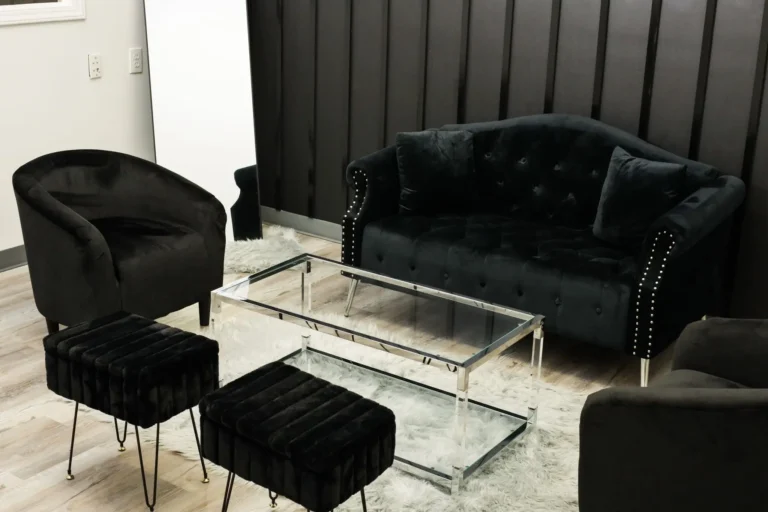 Spacious hall with banquet tables and chandelier lighting